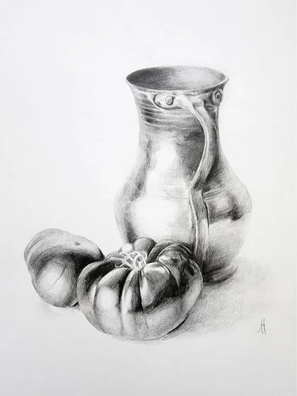A metal jug beside a small pumpkin