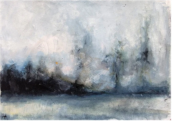 A misty treeline at the edge of still water