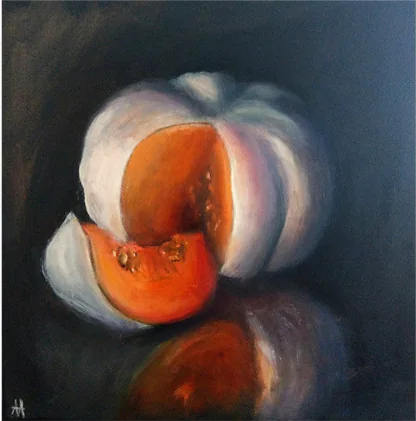 A halved orange fruit on a dark ground